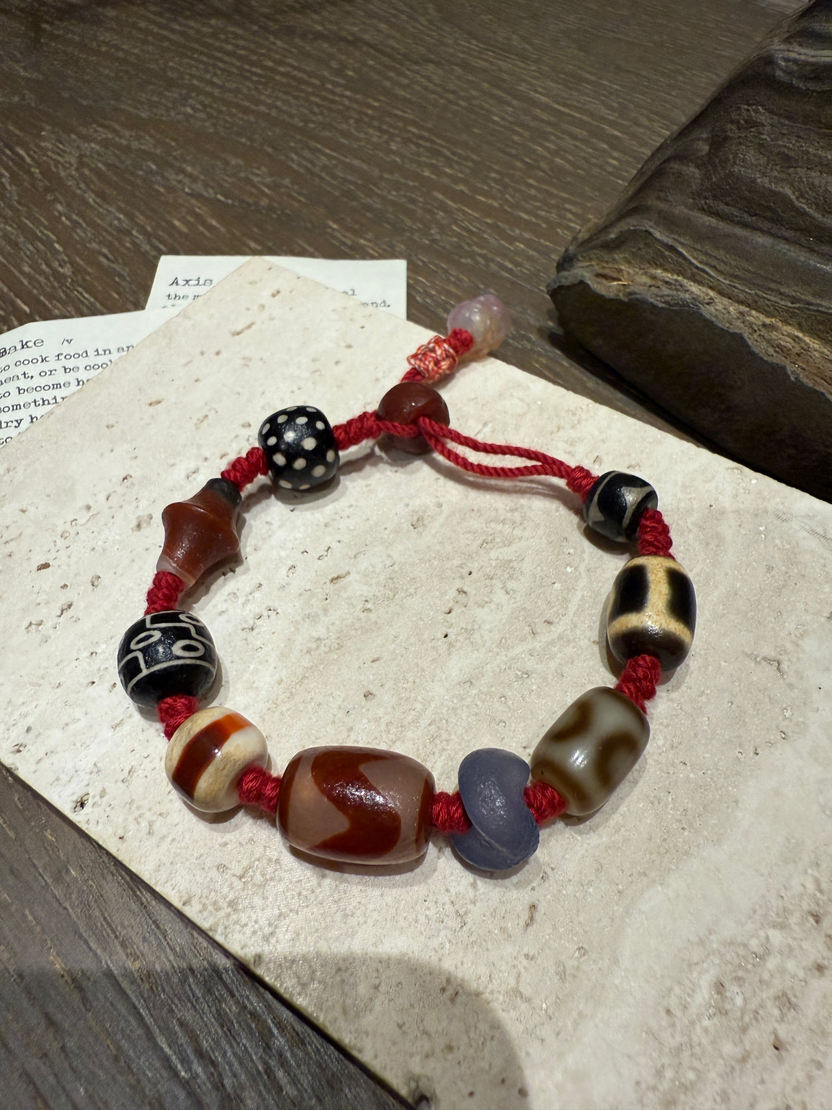 Red-Cord Agate Bracelet with Dzi Accents and Carved Charm