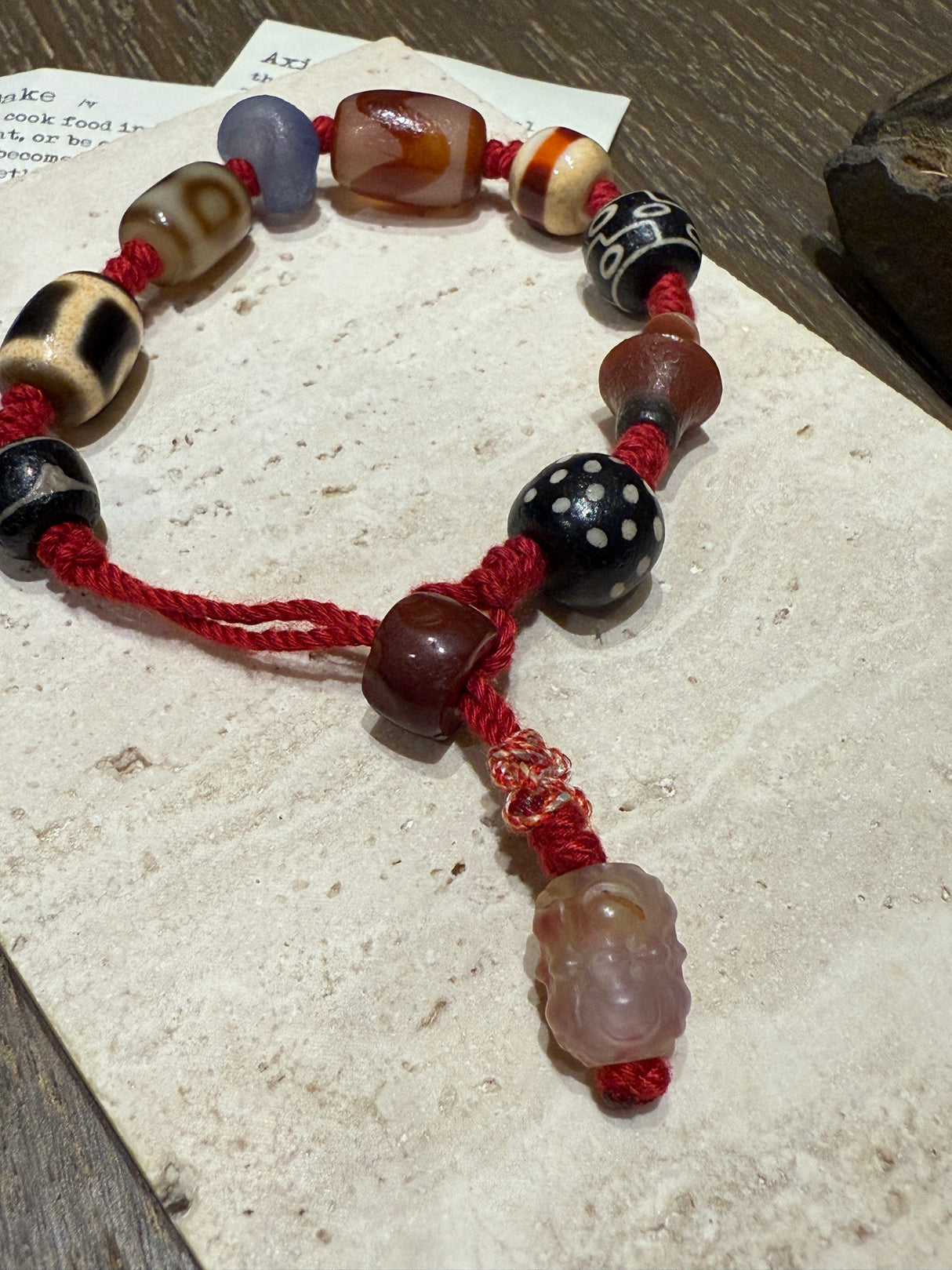 Red-Cord Agate Bracelet with Dzi Accents and Carved Charm