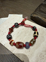 Red-Cord Agate Bracelet with Dzi Accents and Carved Charm