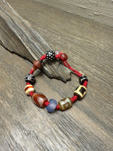 Red-Cord Agate Bracelet with Dzi Accents and Carved Charm