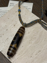 Dzi Bead Pendant Necklace with Braided Blue - Gold Cord