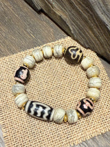Ancient Yak Bone with Heavenly Patterns · Tibetan - Charm Bracelet with Golden Accents
