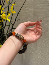 Tibetan Nine - Eye Dzi Bead Bracelet